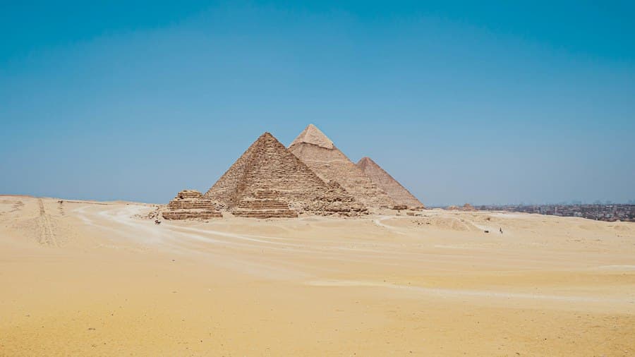 The ancient pyramids of Giza rising from the Egyptian desert